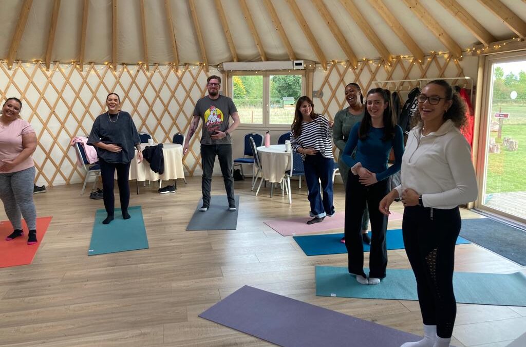 Company wellbeing, team retreat at the Wellness Yurt, Laughter Yoga Health benefits