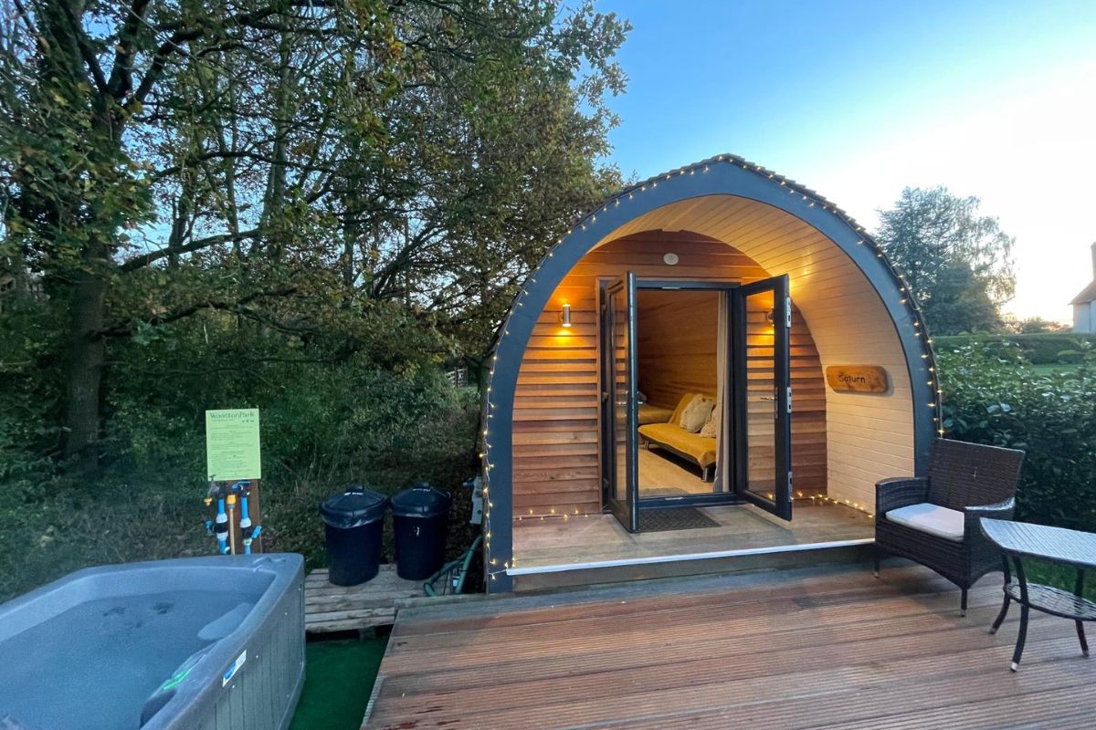 Saturn MegaPod Plus. dusk time. luxury accommodation, private hot tub, fully self-contained